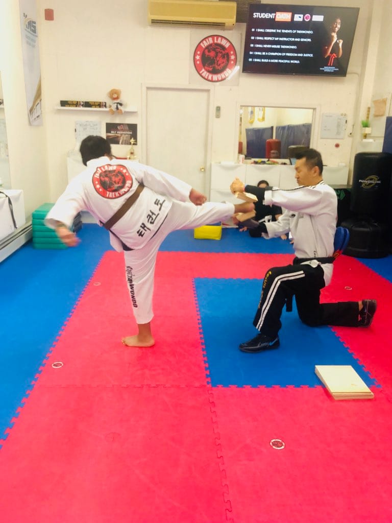 Board-break kick during belt test